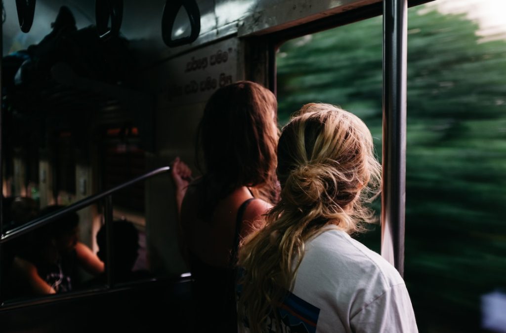 Woman staring outside in the metro