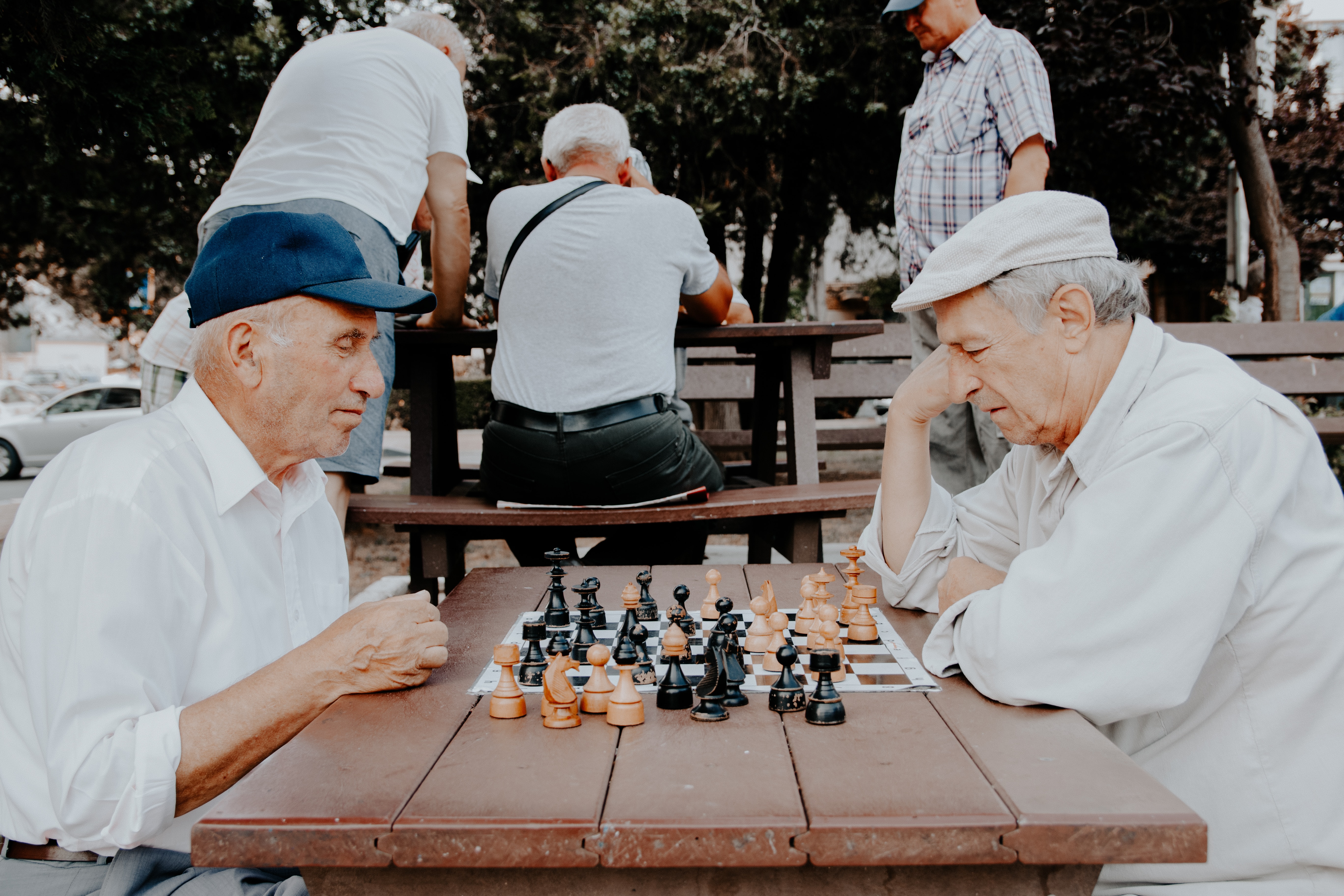 2 aged men playing chess
