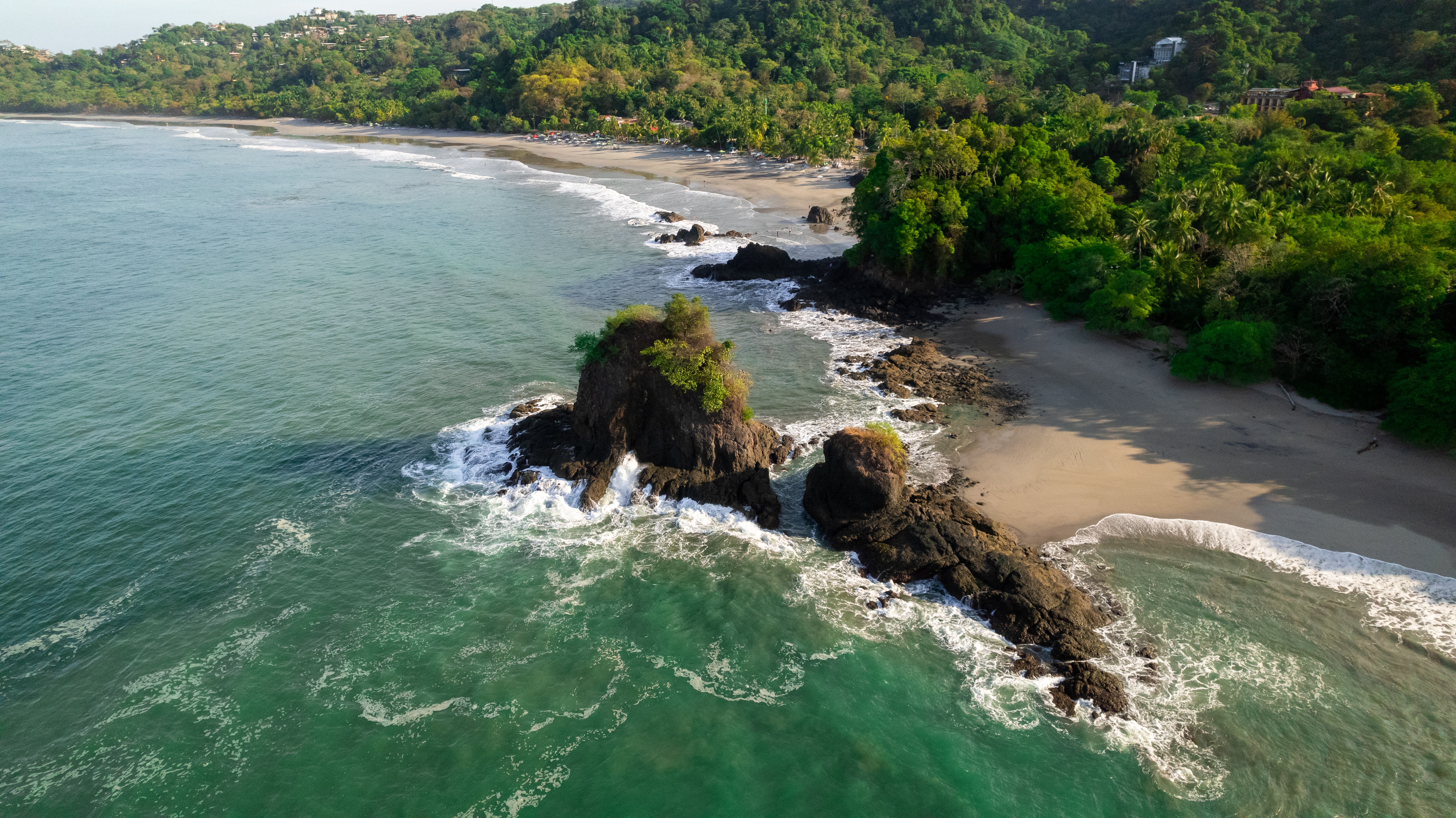 Aerial view of beach and forested area in Costa Rica