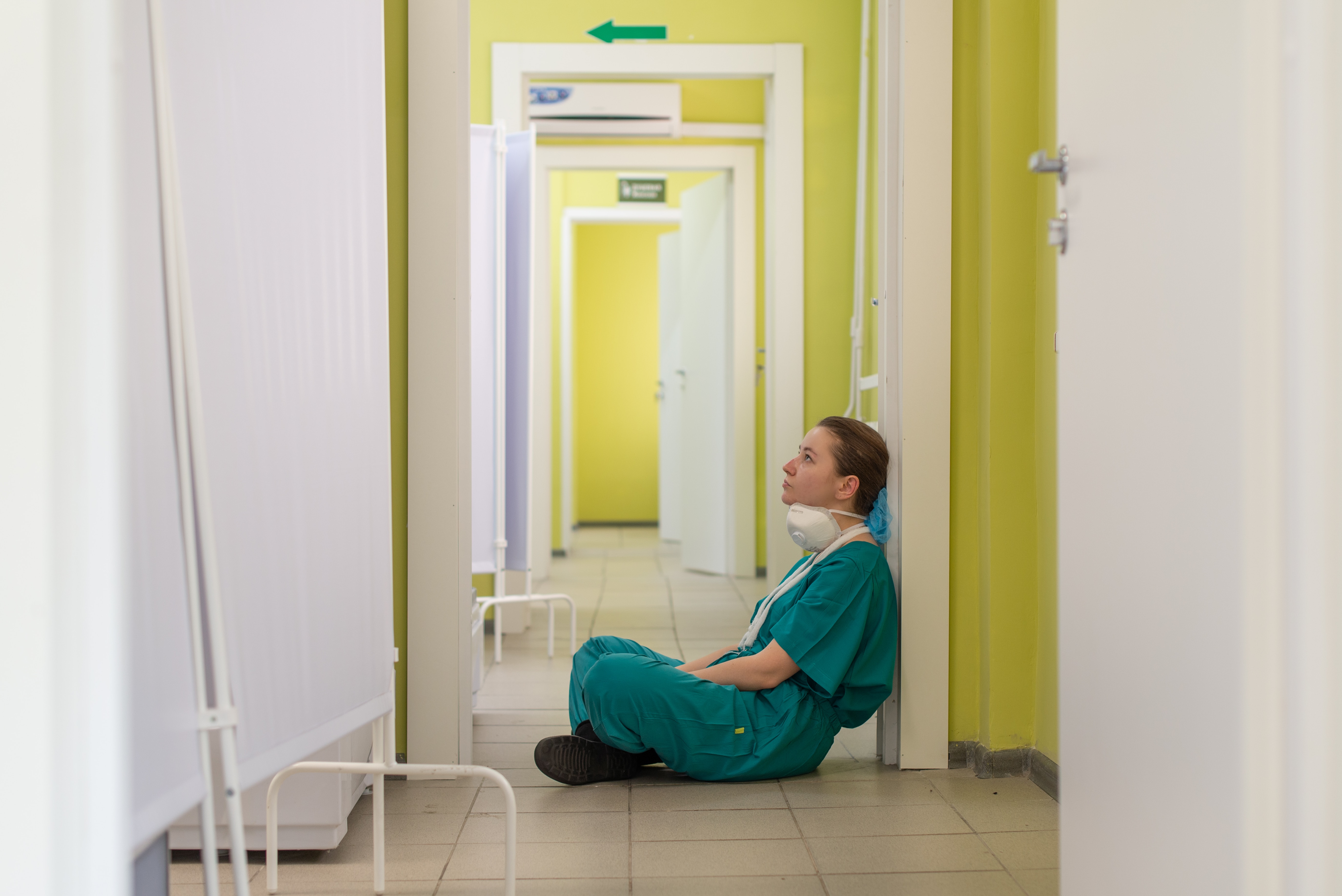 nurse sitting on the floor